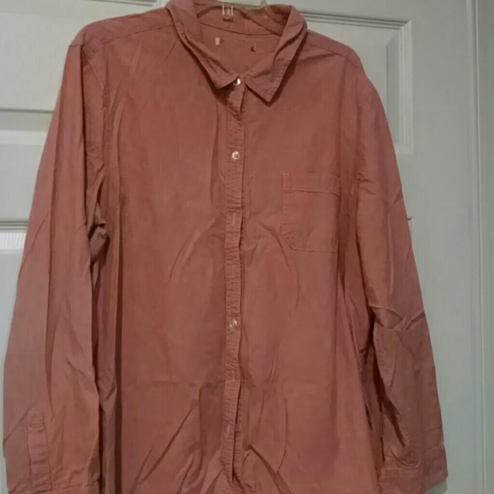 Long sleeve faded red color shirt.